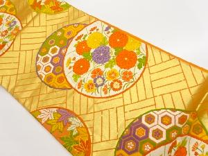 丸文に菊・撫子・花亀甲模様織出し袋帯